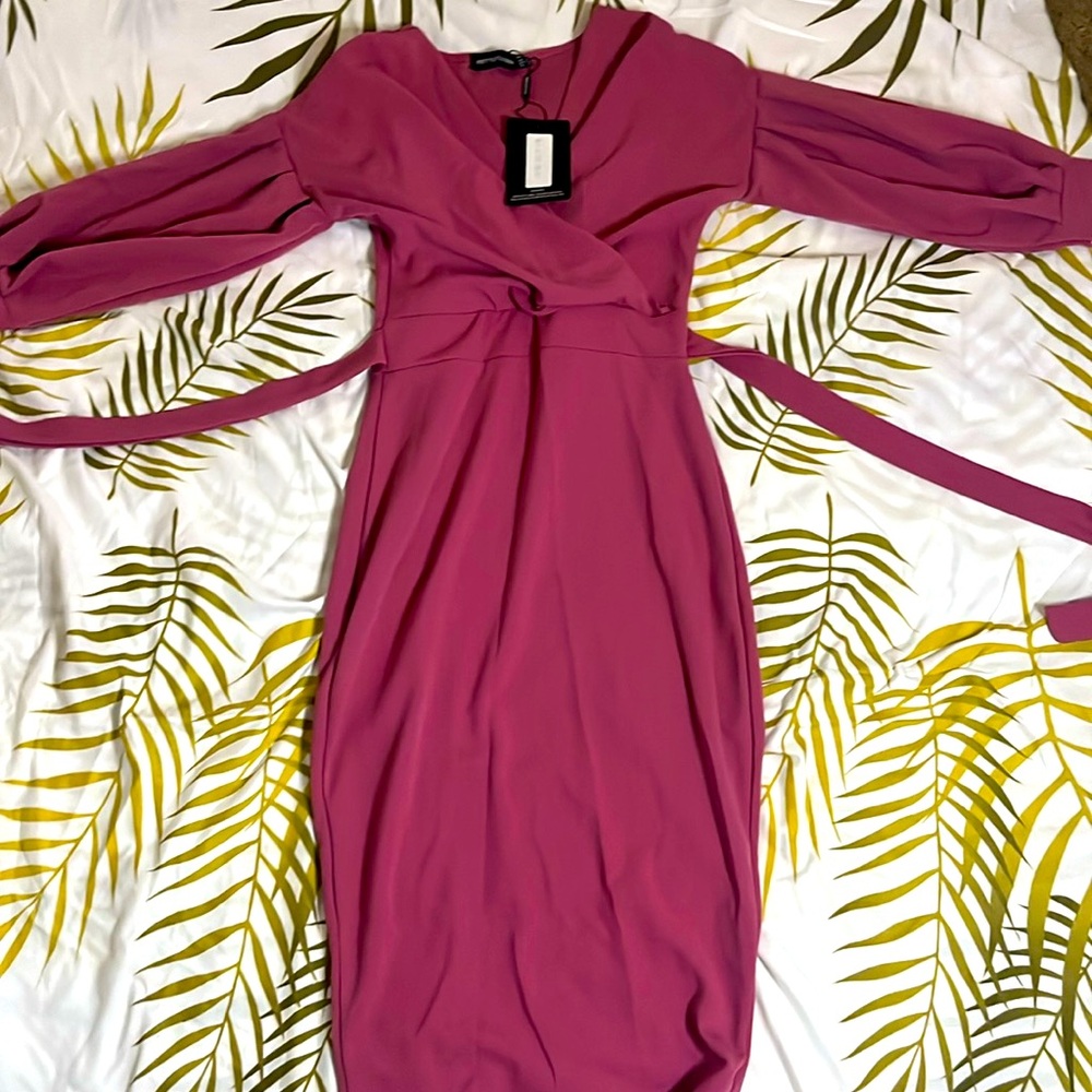 Rose colored dress , ties in the back.